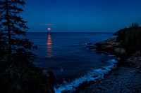 Full Buck Moon (July) rises over Monument Cove